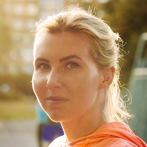 Portrait of confident sporty woman at basketball court
